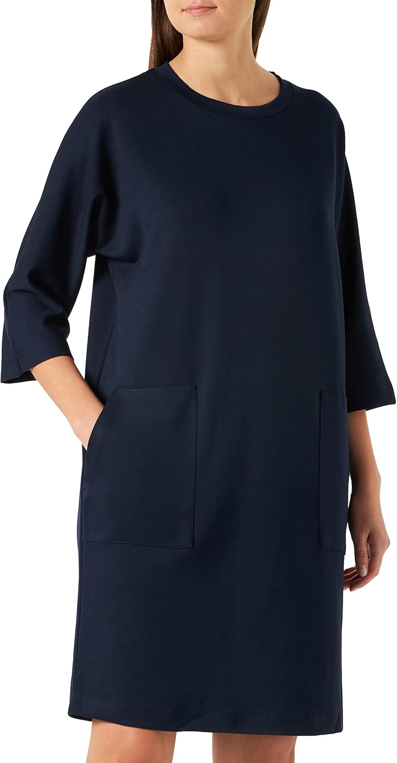 Pavo Monitor Arm installed on a modern office desk